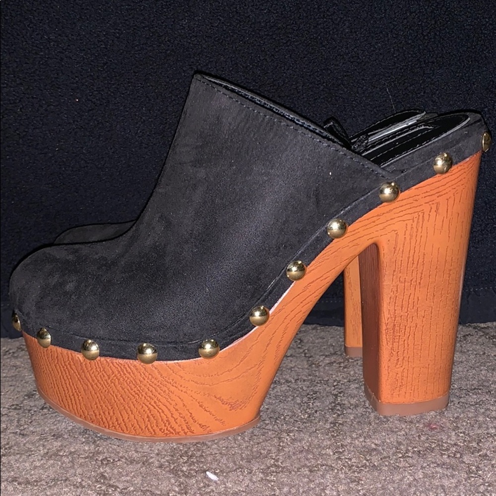 Black and brown clogs